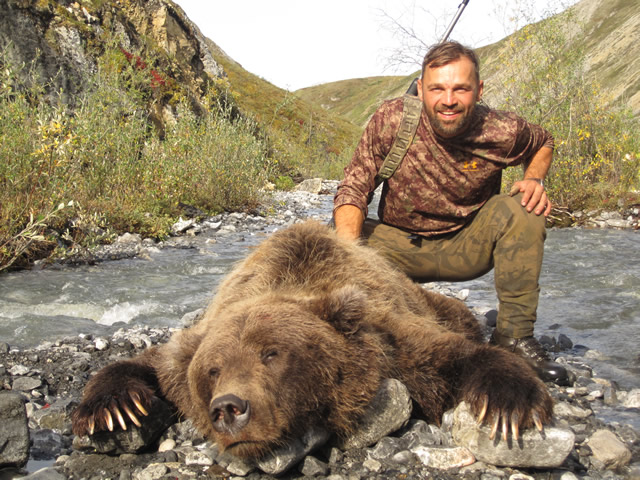 Chris Haley with Trpohy Artic Grizzly Bear