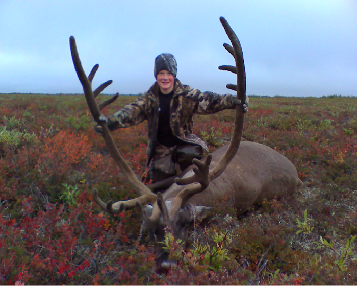 Jason Mc Kee with a great caribou taken with his father in the brooks  range 2008