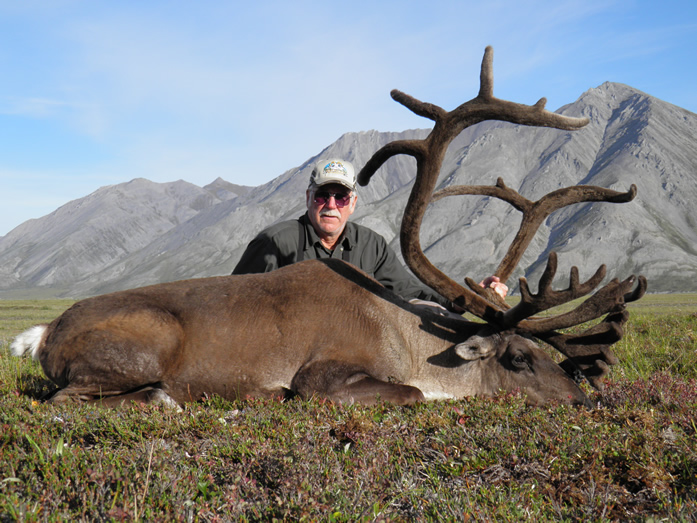 Larry Chevreny  with first  of 2 Trophy Brooks Range Caribou 2010