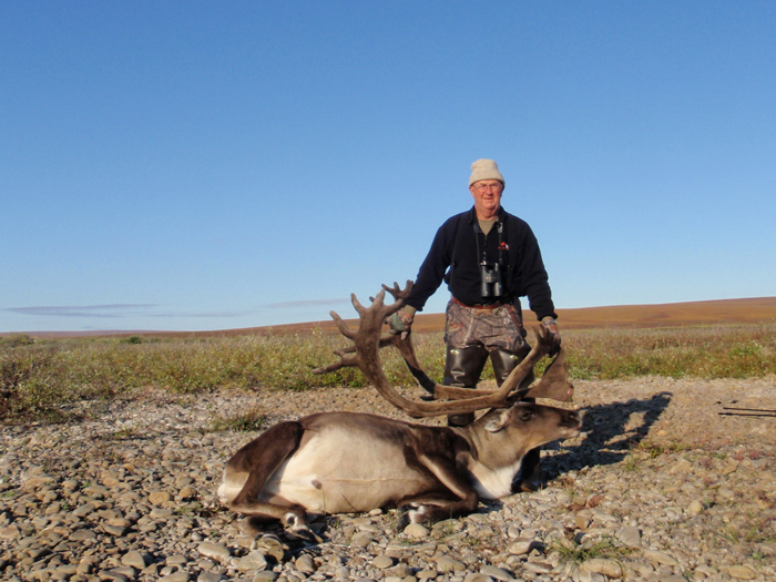 Thomas Albrecht with his trophy brooks rang caribou